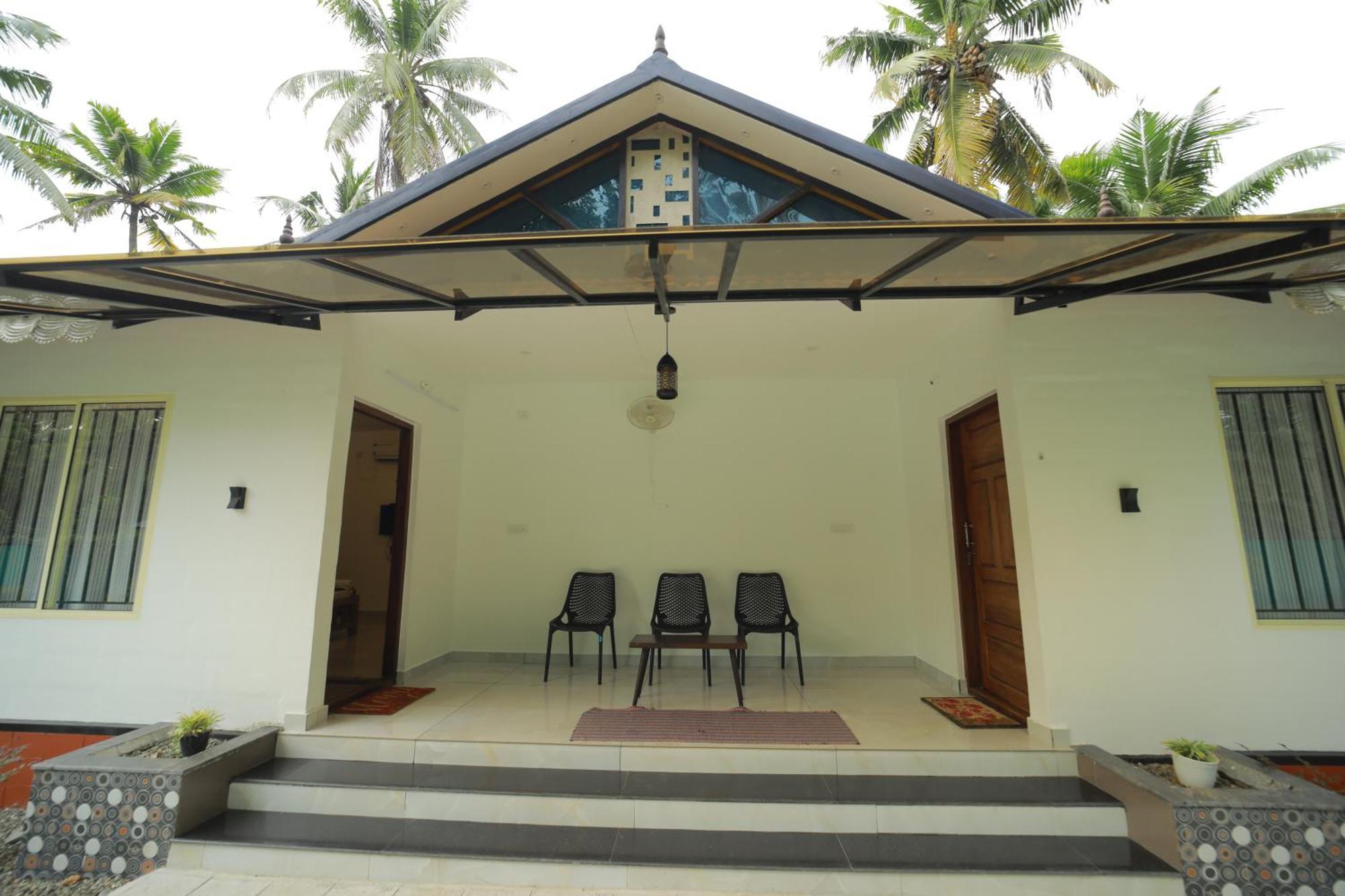 Prakruthi Residency Munroeisland Homestay